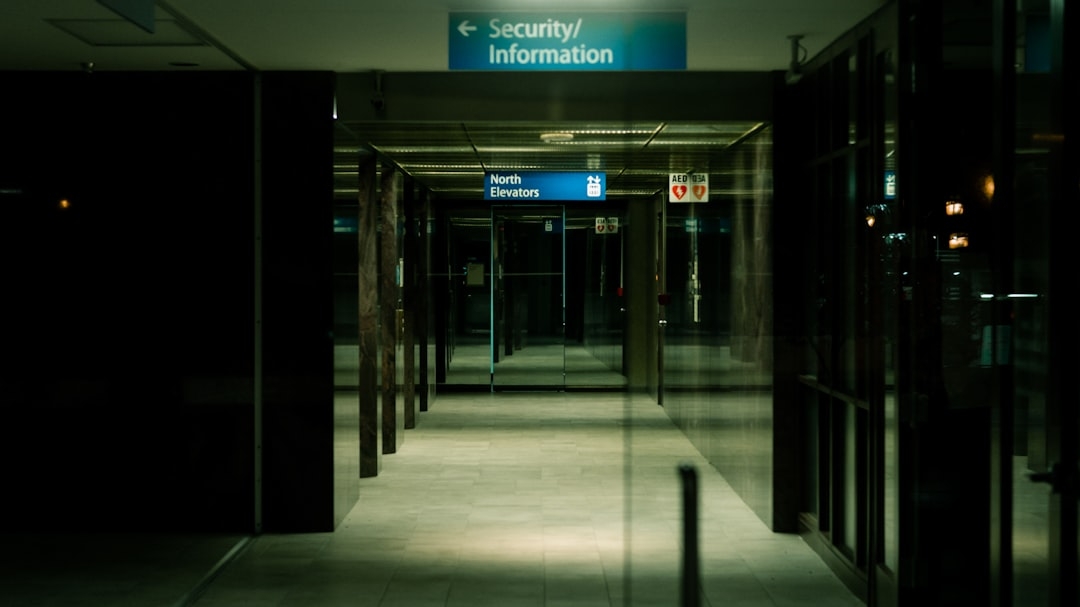 a long hallway with glass doors